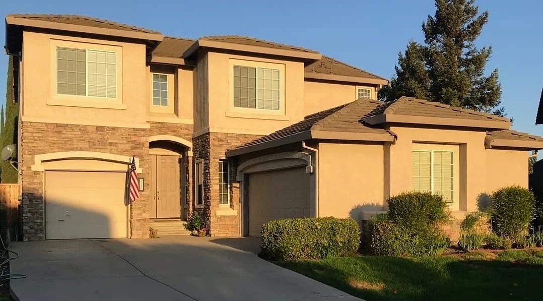 Stucco Home Exterior painted by Wall 2 Wall Painting