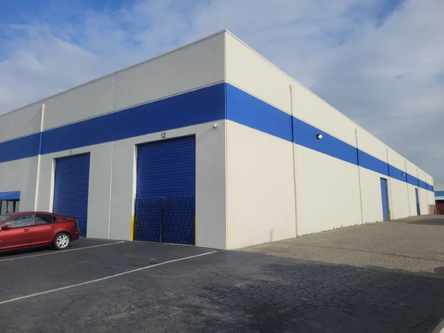 Warehouse Exterior painted by Wall 2 Wall Painting